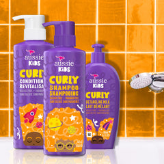 Aussie Kids curly hair after wash with defined, bouncy curls.