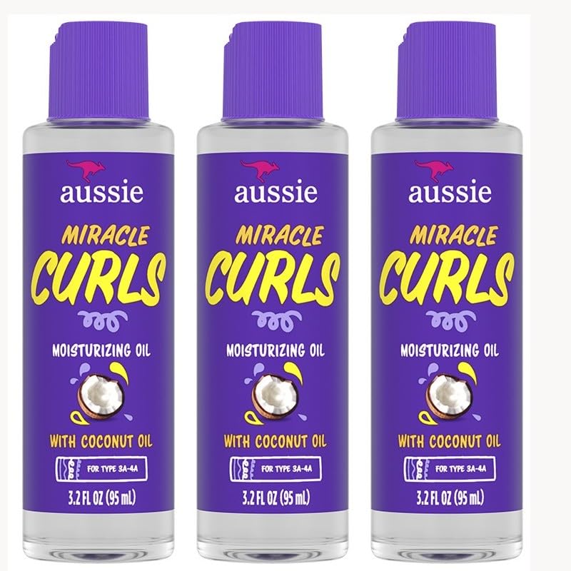 Aussie Miracle Curls Defining Oil bottle closeup showing hydration and shine for curly hair.