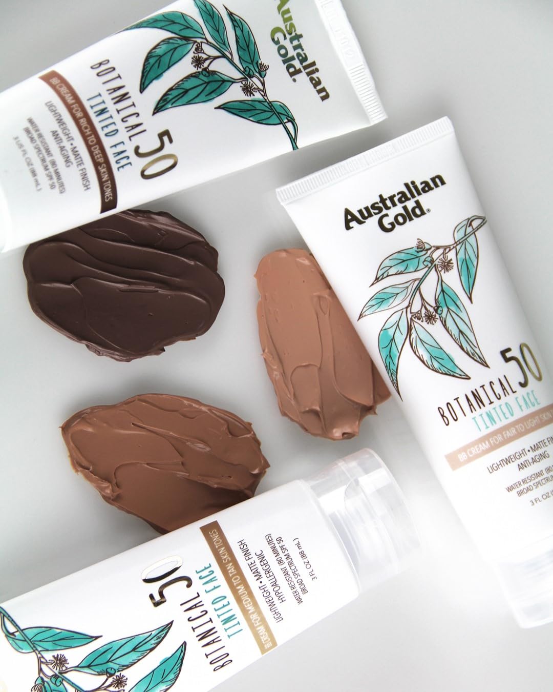 Australian Gold Botanical SPF 50 tinted face lotion sensitive skin closeup demonstrates gentle, non-irritating formula.