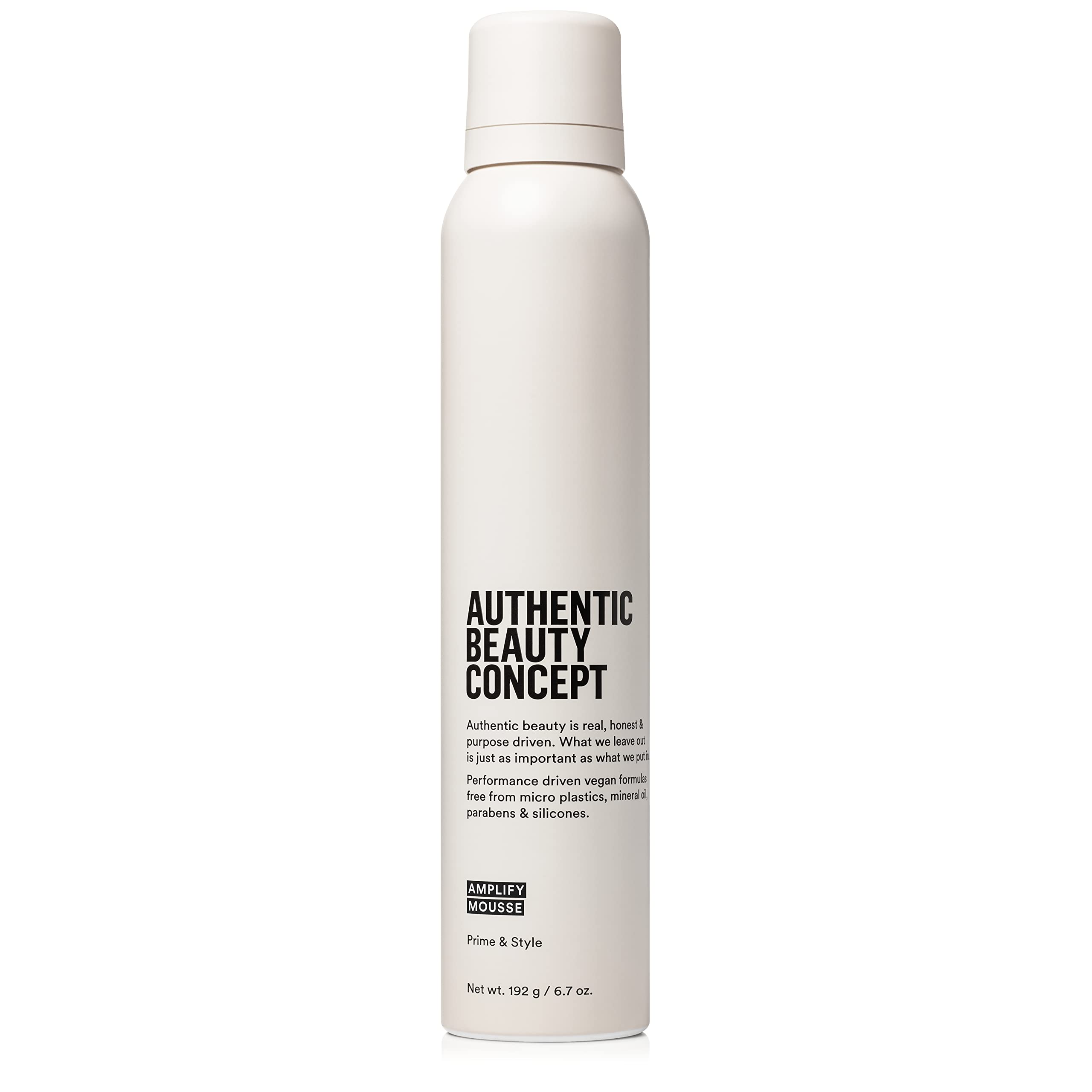 Authentic Beauty Concept Amplify Mousse bottle with pump for easy, lightweight styling.