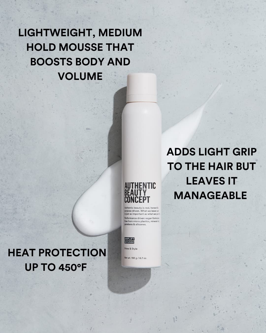 Authentic Beauty Concept Amplify Mousse being dispensed for even foam distribution.