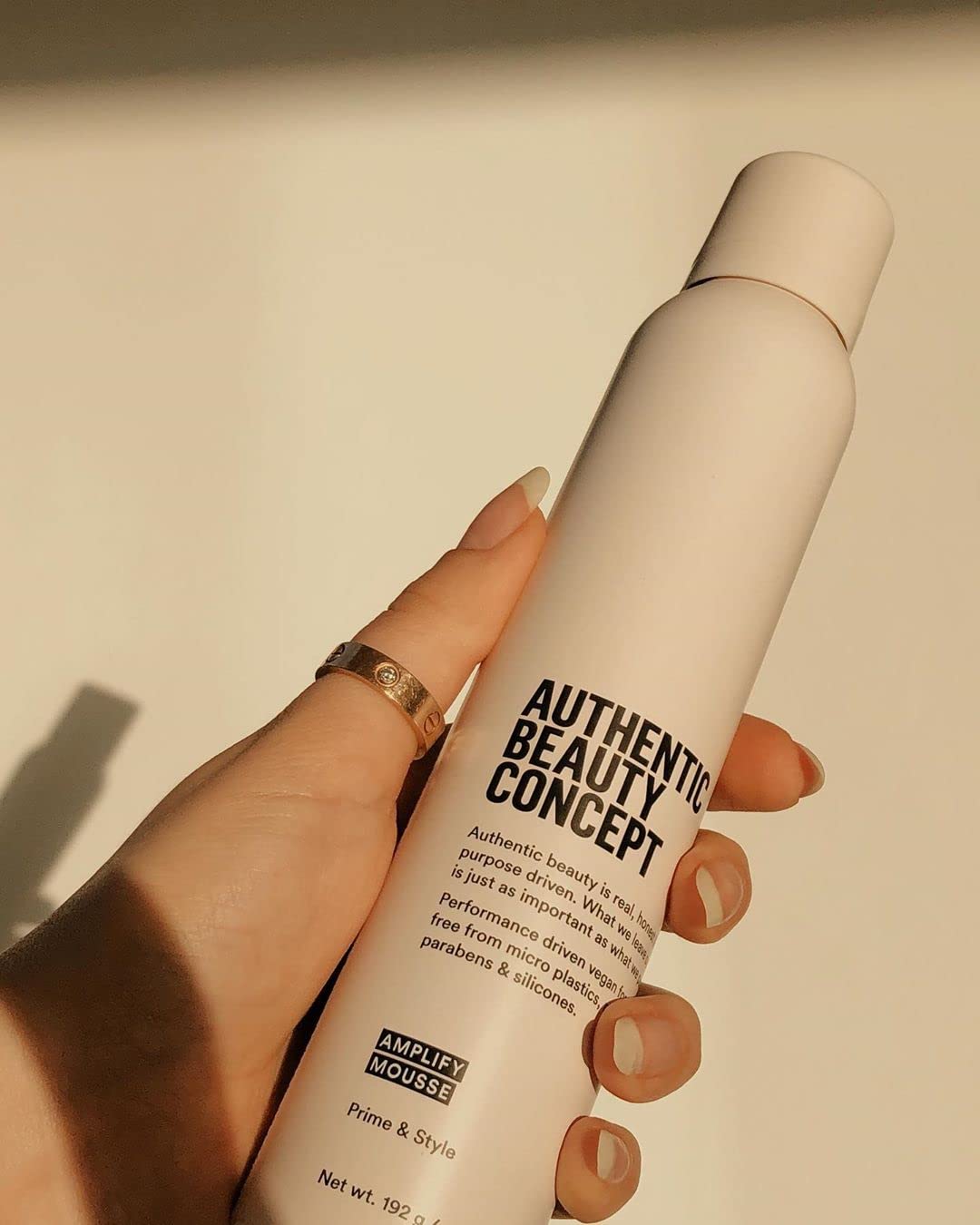 Authentic Beauty Concept Amplify Mousse vegan and cruelty-free certification visible on packaging.