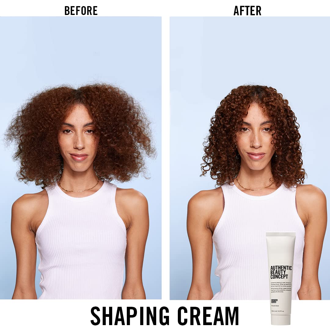 Damp hair being shaped with cream for defined texture during application