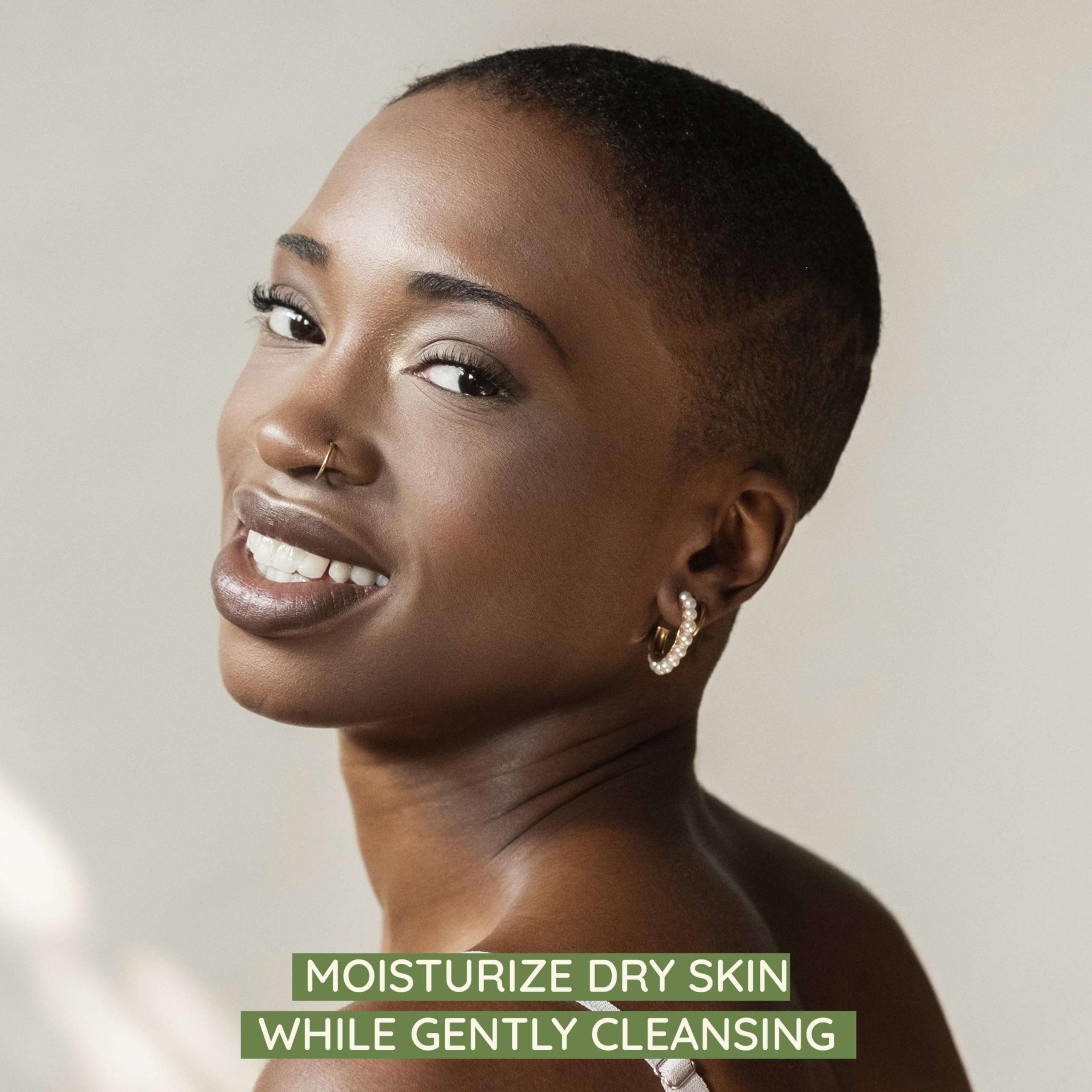 Aveeno cleansing bar on towel-dried skin showing soft, smooth results.