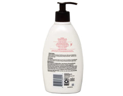 Aveeno Creamy Oil applied to skin delivers soft hydration.