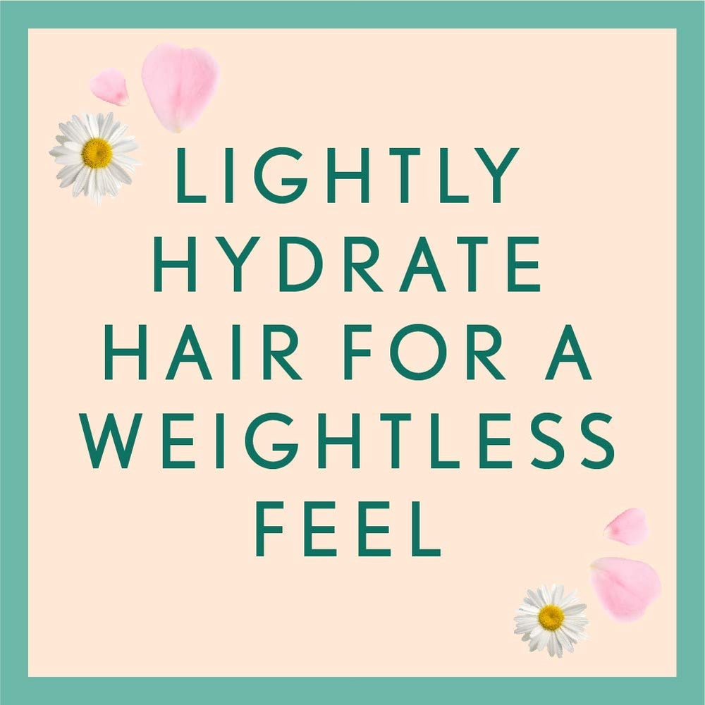 Aveeno Rosewater Chamomile shampoo pour-dispense demonstrates soothing aroma for daily use.