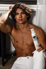 The mousse foam texture demonstrates lightweight, flexible hold on curls.