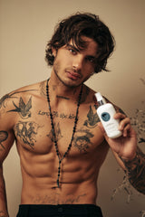Avenue Man sea salt spray on model demonstrates natural volume and flexible hold.