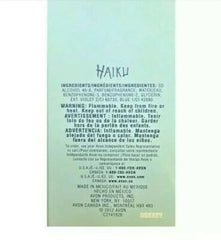 AVON Haiku EDP on wrist demonstrates portable fragrance use.