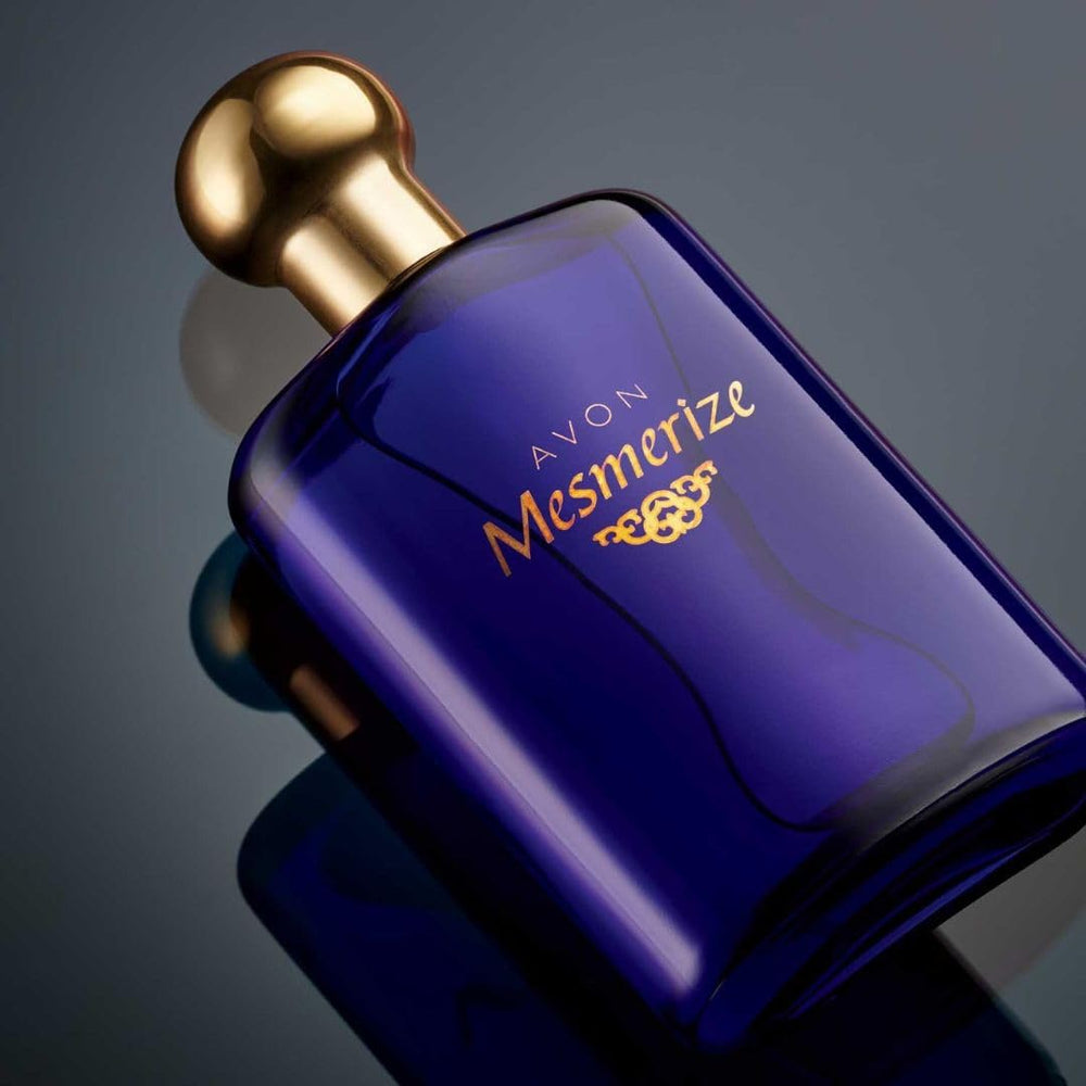 AVON Mesmerize being applied to wrist demonstrates long-lasting wear.
