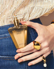 AVON Rare Gold mandarin zest visualization suggests refreshing, bright notes for daytime wear.