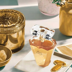 AVON Rare Gold ylang-ylang bloom hints at tropical floral depth and smoothness.