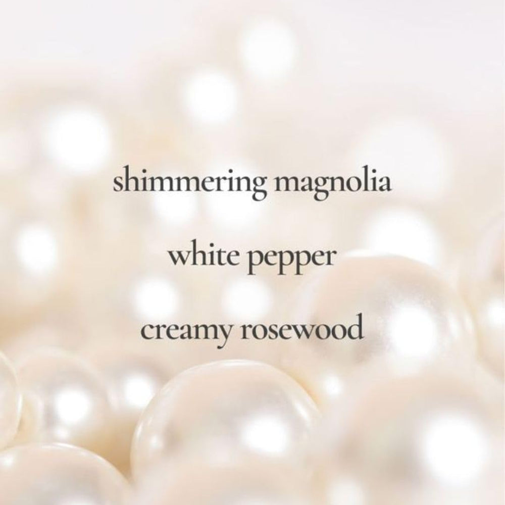 AVON Rare Pearls magnolia note closeup highlights bright floral opening.