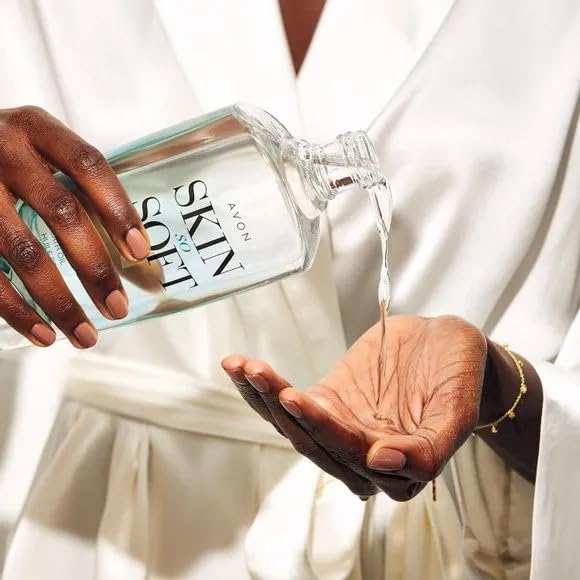 Avon Skin So Soft Original bath oil in a serene bath scene suggests spa-like moisture.