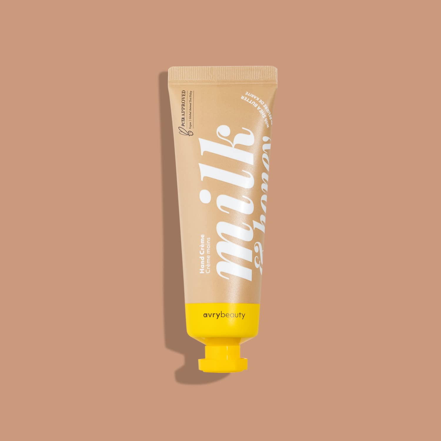 AVRYBEAUTY Milk & Honey lotion texture close-up highlighting quick-absorb, non-greasy hydration.