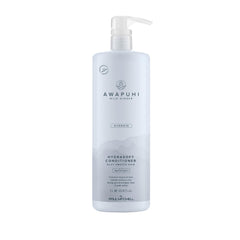 Awapuhi Wild Ginger HydraSoft conditioner bottle pour shows easy application and instant hydration.