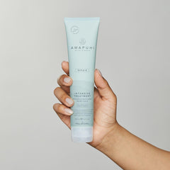 Awapuhi Wild Ginger Intensive Treatment being applied for deep conditioning