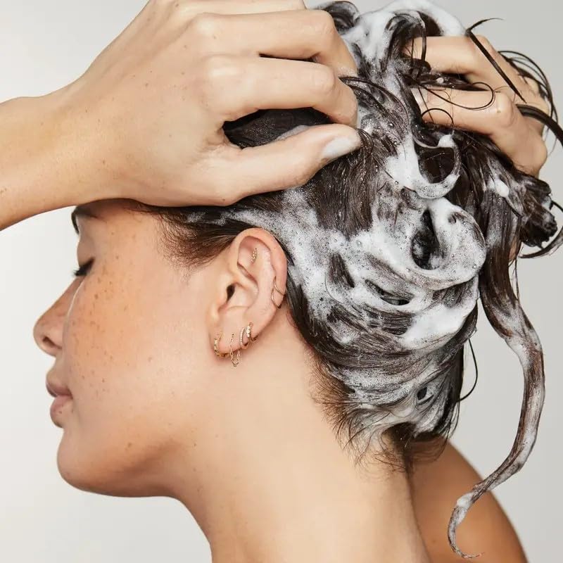 Awapuhi Wild Ginger HydraSoft Shampoo label highlighting color-safe and sulfate-free formula.
