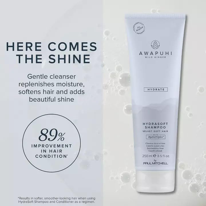 Awapuhi Wild Ginger HydraSoft Shampoo lather clinging to strands for smooth finish.