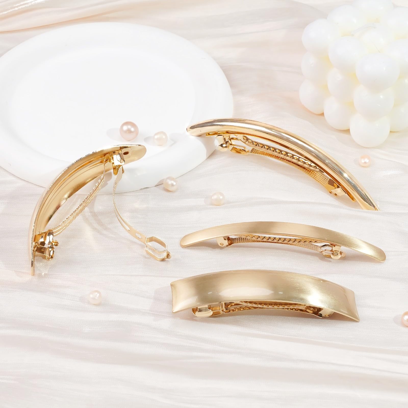 Ayesha flat-metal hair clip in pony style secures sleek ponytails with comfortable all-day hold.