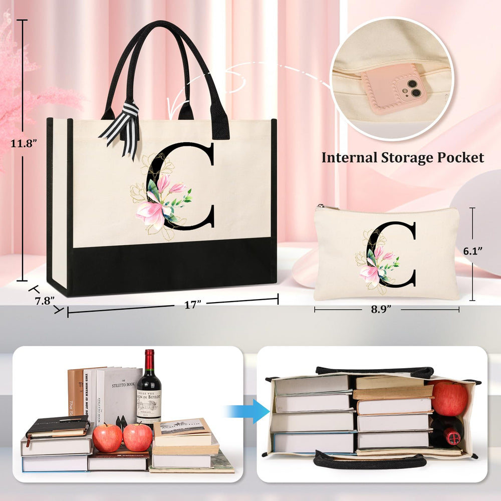 AYGE monogrammed canvas makeup bag keeps cosmetics neatly organized.