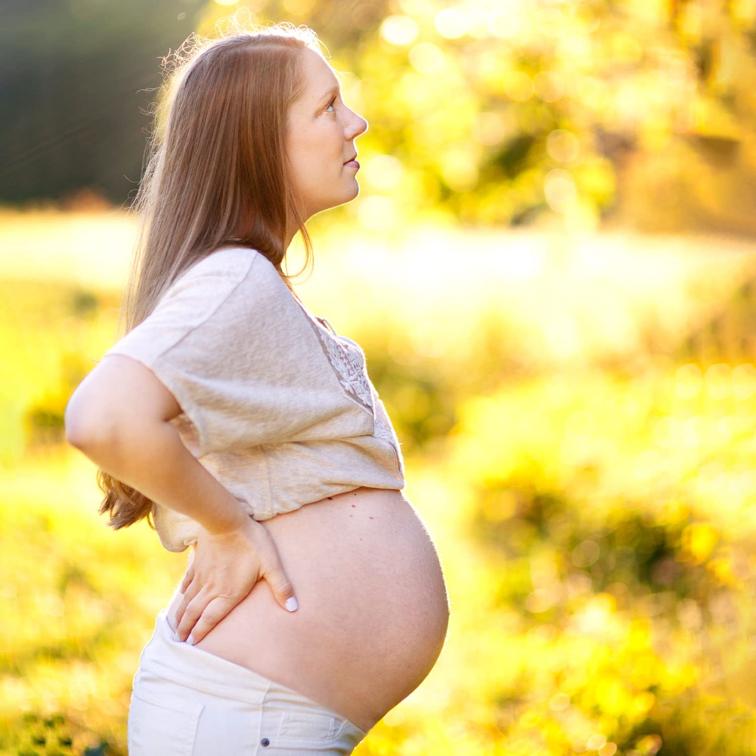 Badger Belly Butter coconut oil and calendula nourish gently during pregnancy.