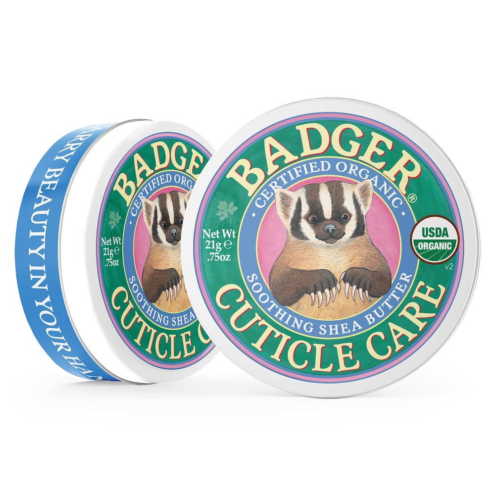 Applying Badger balm on nails and cuticles for smoother, healthier-looking hands.