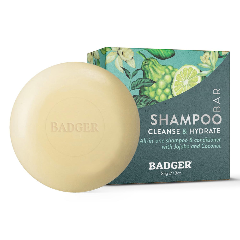 Badger jojoba-baobab shampoo bar closeup shows nourishing oils for hair