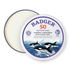 Badger SPF50 mineral sunscreen tin closed; reef-safe protection for daily sun exposure