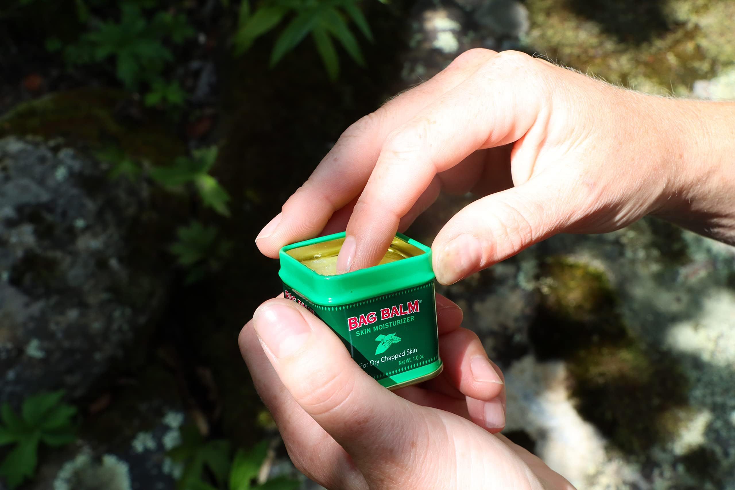 Bag Balm mini tin open package reveals three tins