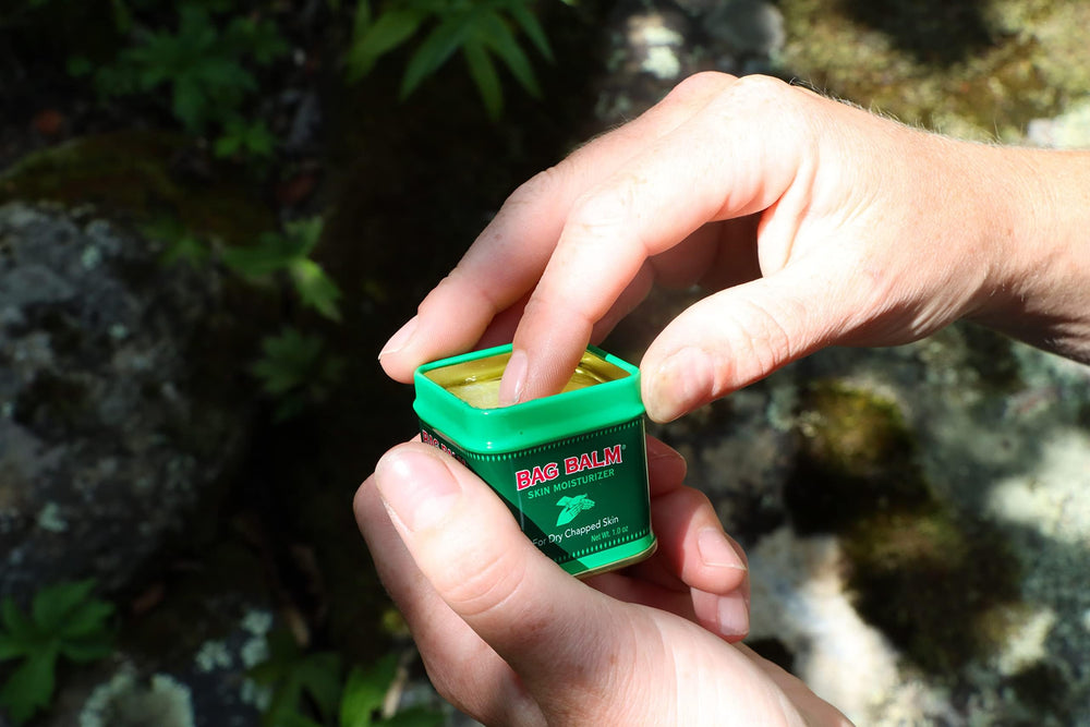 Bag Balm mini tin open package reveals three tins