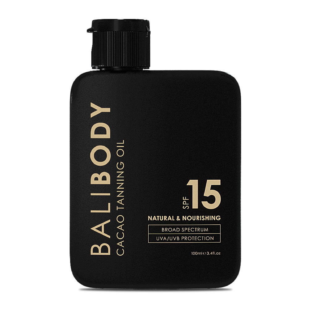 Bali Body Cacao Tanning Oil SPF15 bottle enhances bronze glow with hydration.