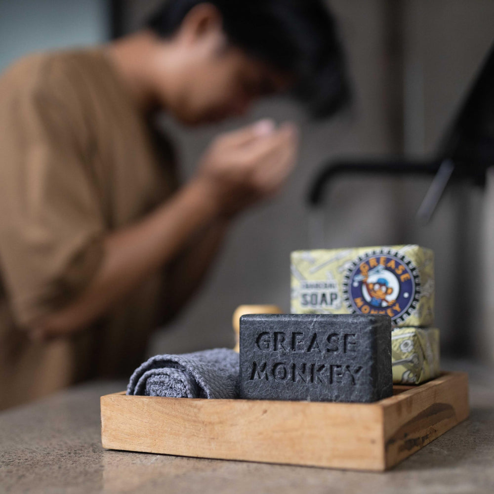 Bali Soap Grease Monkey exfoliating charcoal highlights dirt removal.