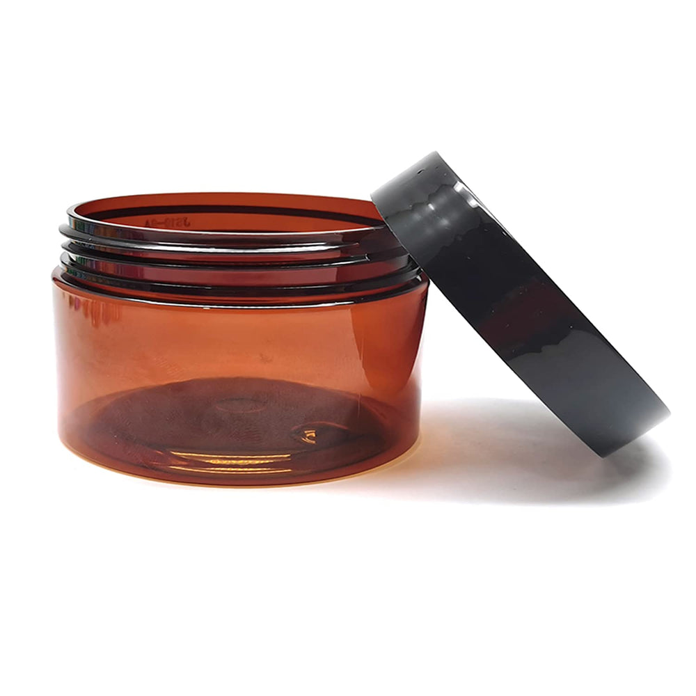 BallHull amber jar demonstrates 2.7 inch diameter and 2 inch height for compact storage.