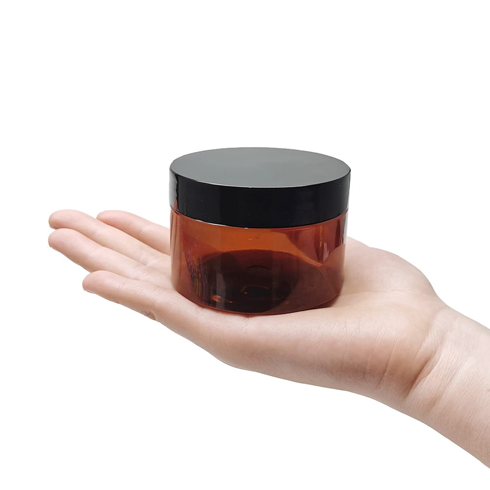 BallHull amber jar with lid open, ready to fill with lotion or ointment.