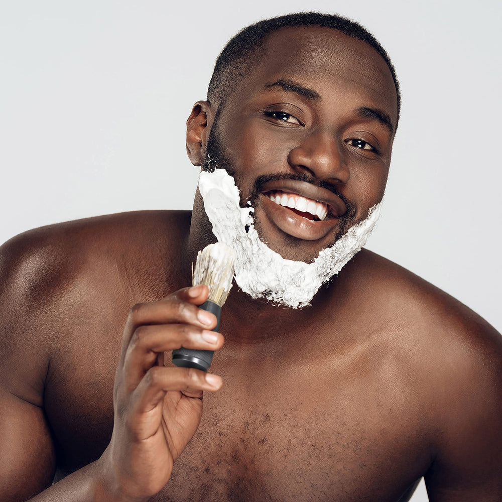 Bambaw shaving brush in travel setup shows compact, durable daily carry.