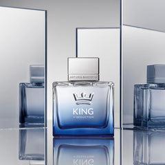 Banderas Antonio King of Seduction bottle on wood surface evokes warm, confident vibes