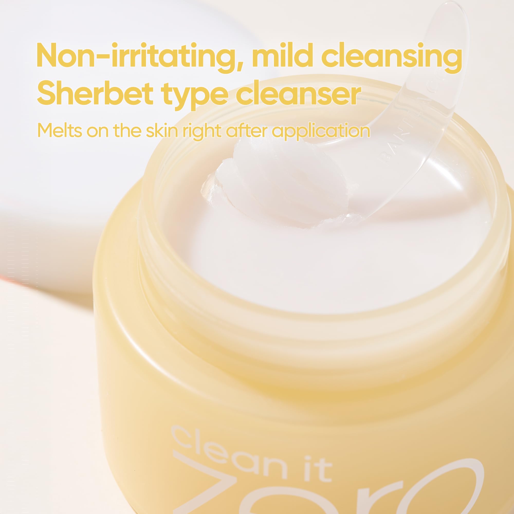 BANILA CO cleansing balm with spatula shown for precise scooping.