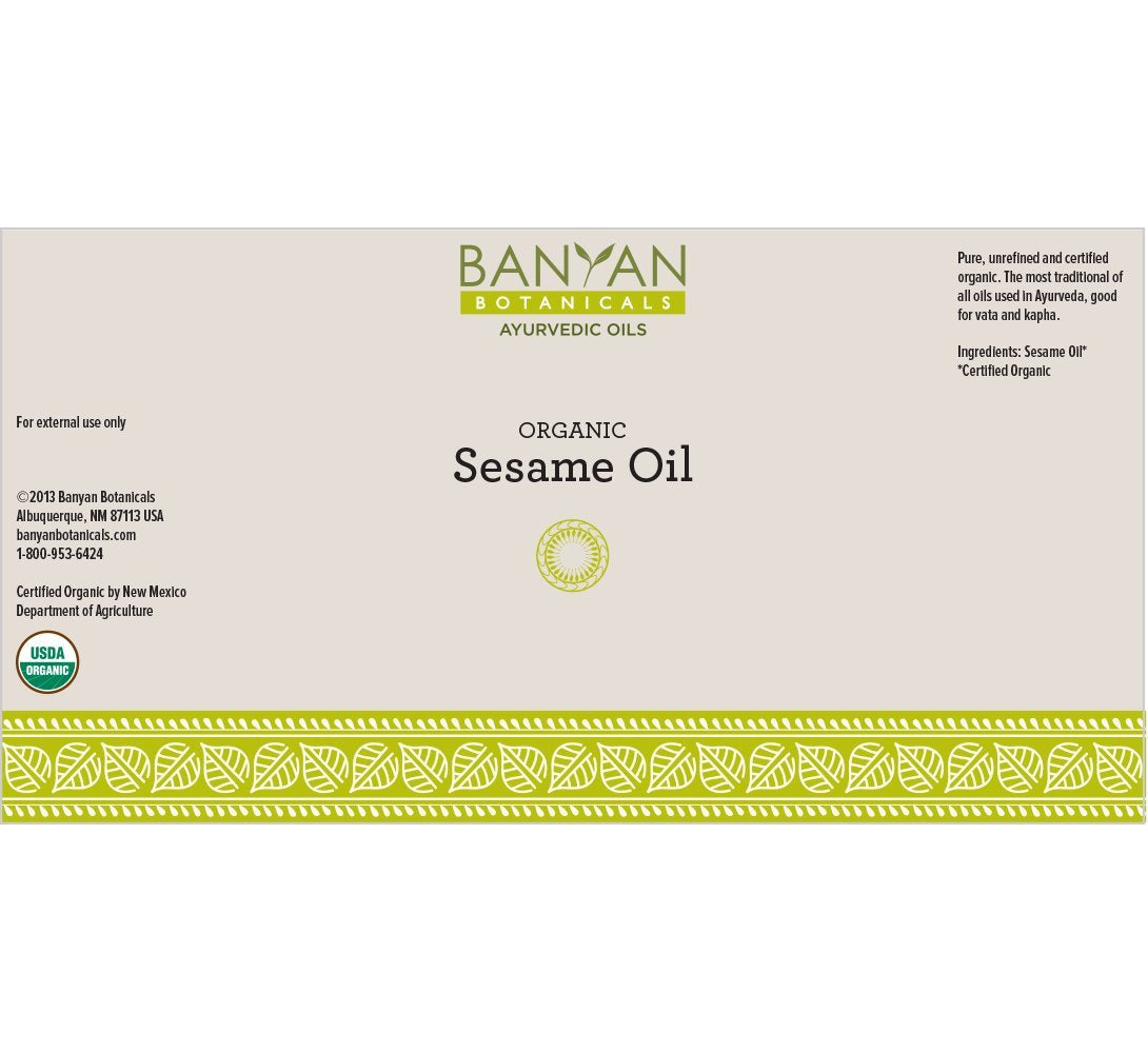 Banyan Botanicals Sesame Oil amber glass jar close-up shows golden unrefined quality