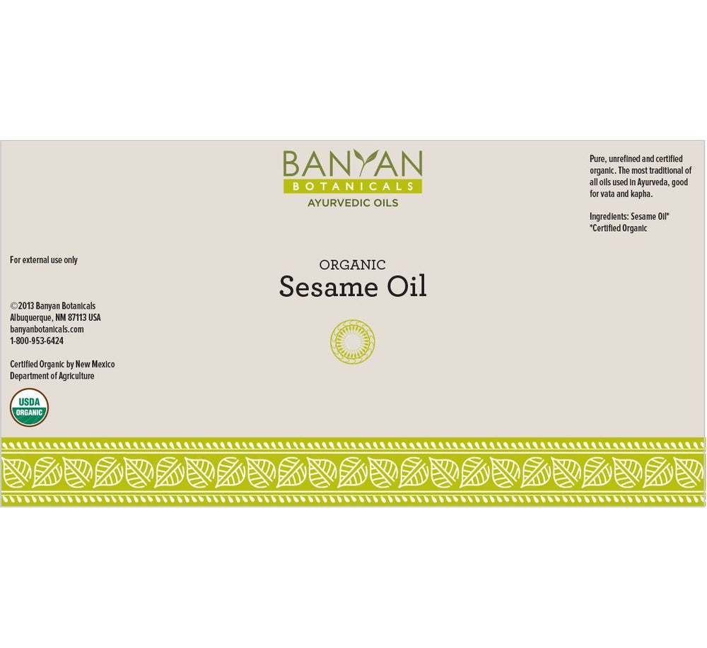 Banyan Botanicals Sesame Oil amber glass jar close-up shows golden unrefined quality