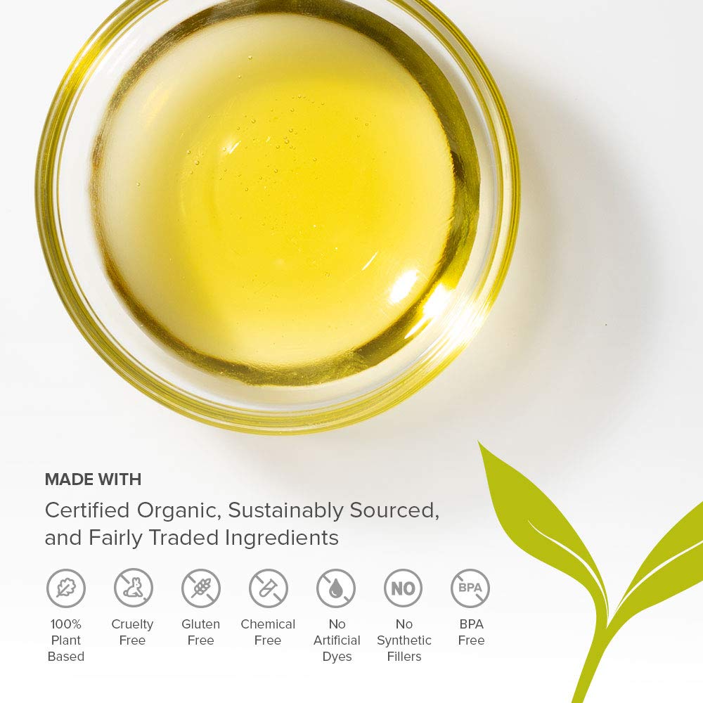 Banyan Botanicals Sesame Oil shown in self-massage setup for abhyanga practice