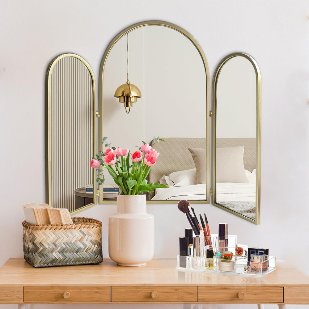 BAODANFU golden arch frame close-up shows luxe décor and reflection