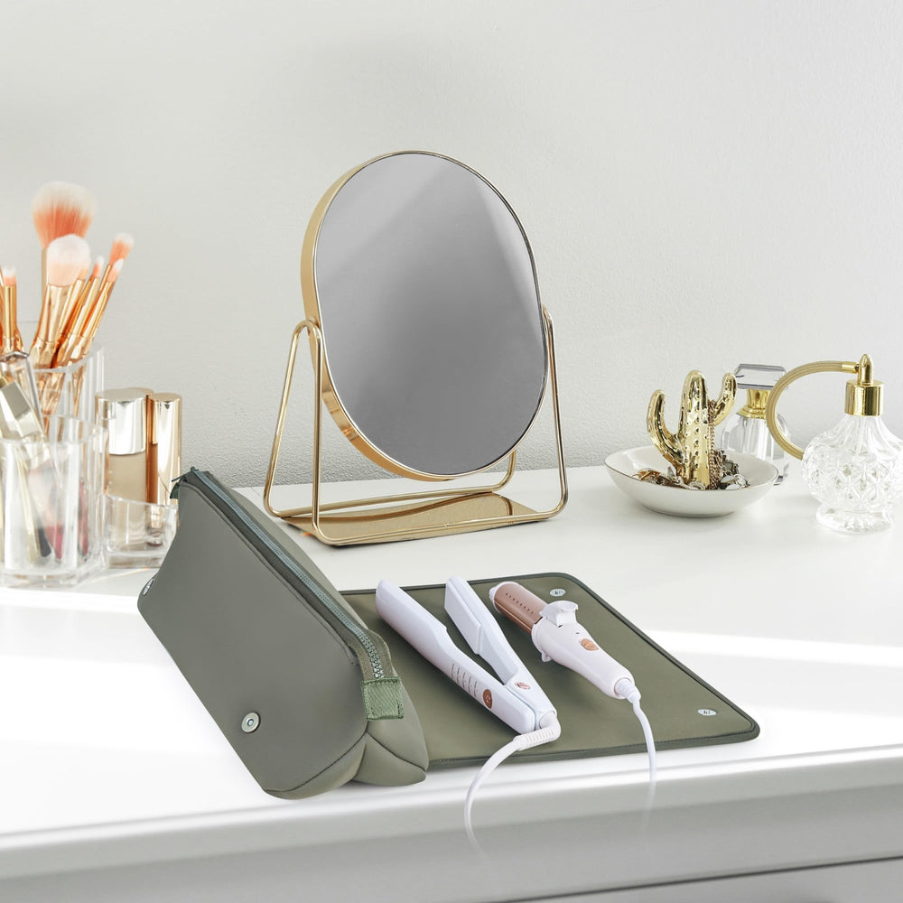 Barefoot Caribou heat resistant mat in use with hot styling tools
