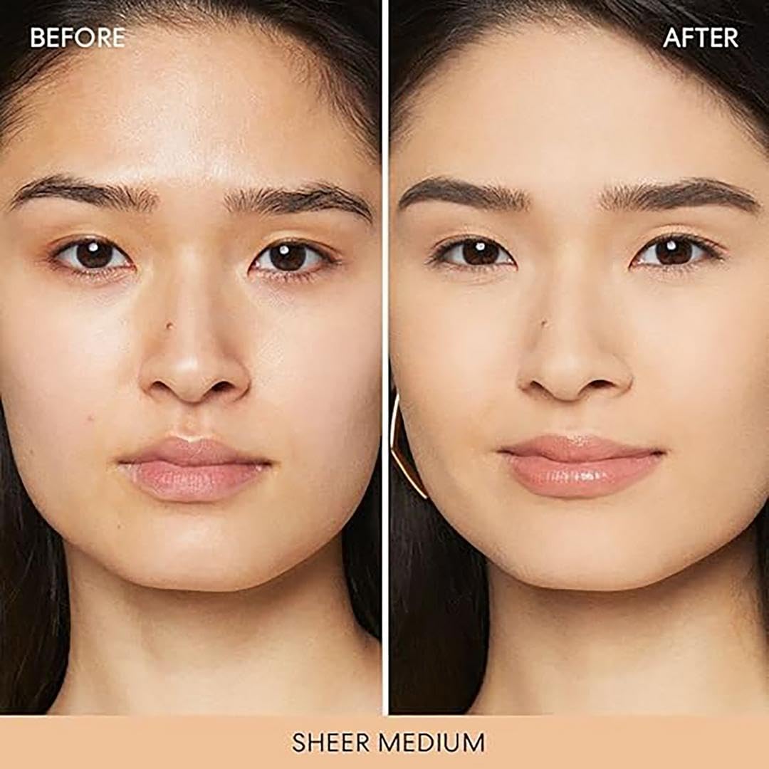 bareMinerals Original Mineral Veil puff on the go demonstrates quick touch ups