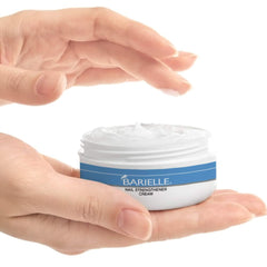 Barielle Nail Strengthener Cream being applied on a nail for growth support.
