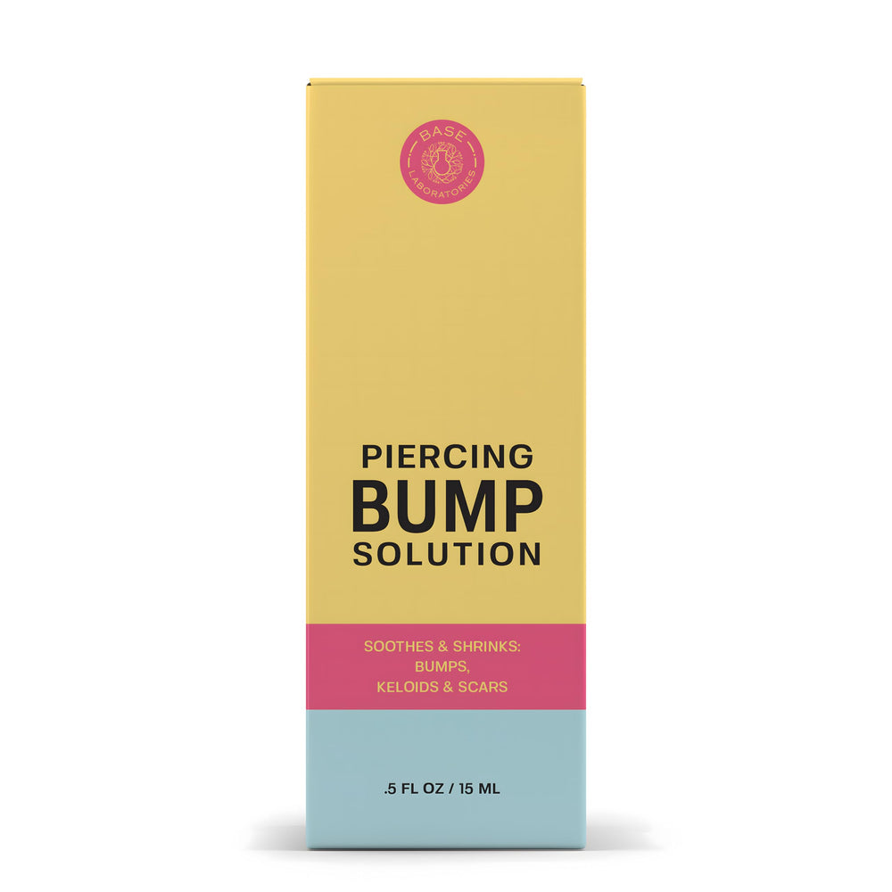 BASE LABORATORIES jojoba grapeseed oil blend close-up highlights moisture for skin around piercings