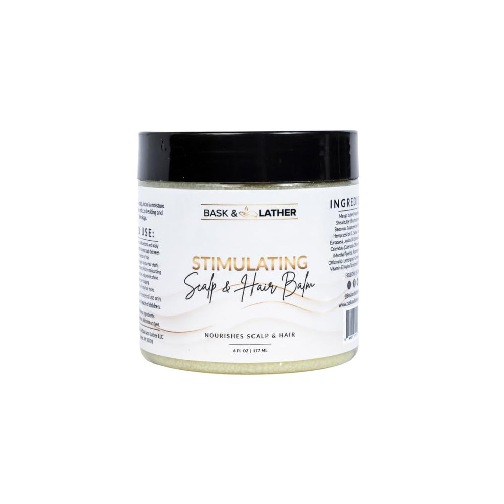 Bask & Lather scalp balm bottle shows mango and peppermint for refreshing moisture.