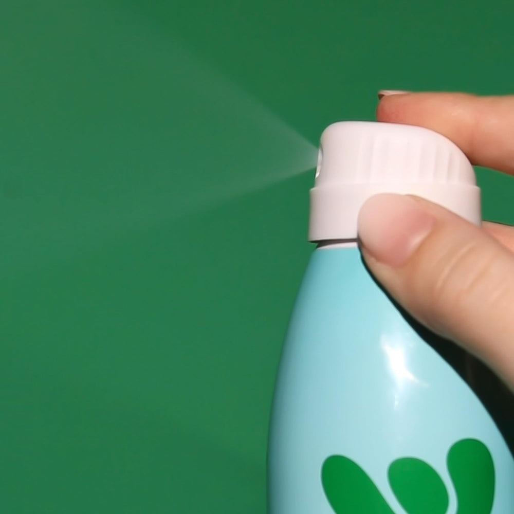 Bask Suncare SPF 30 spray in beach scene highlighting reef-safe protection