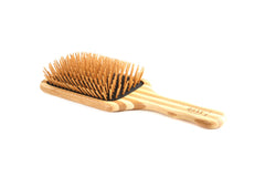 Bass The Green Brush front view shows bamboo pins for gentle detangling and reduced breakage.