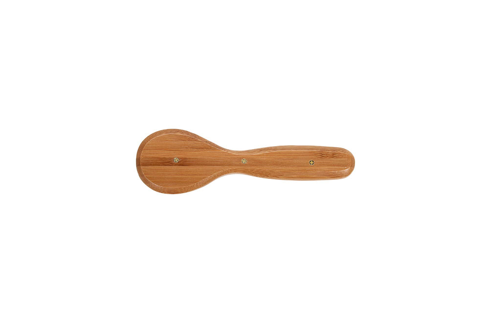 Bass facial cleansing brush wet-before-use tip softens bristles for sensitive skin.